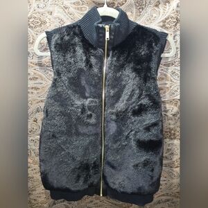 Faux fur stylish Micheal Kors zip up vest.